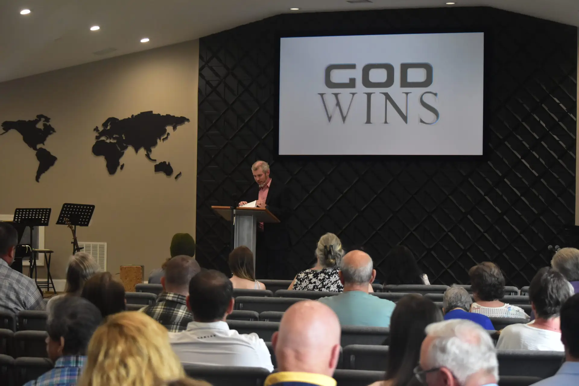 Pastor Tom preaching